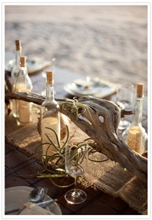 Bottles and Driftwood Centerpiece for beach wedding